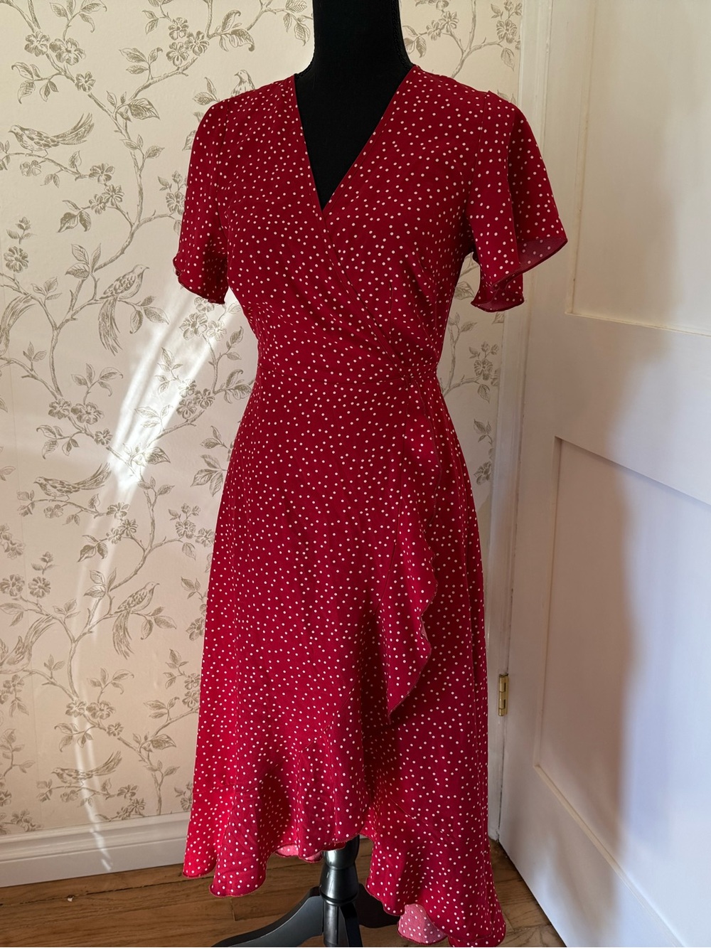 Polka dot ruffle wrap dress